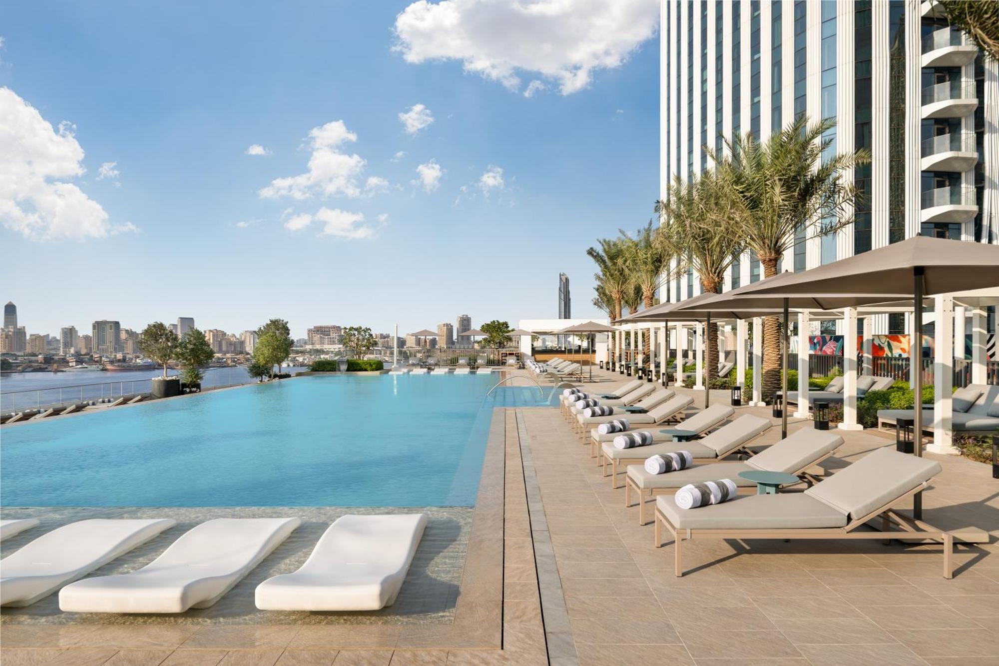 Address Creek Harbour Otel Dubai Dış mekan fotoğraf The swimming pool at the hotel